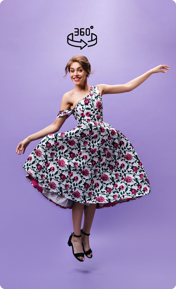 Model twirling in a floral dress
